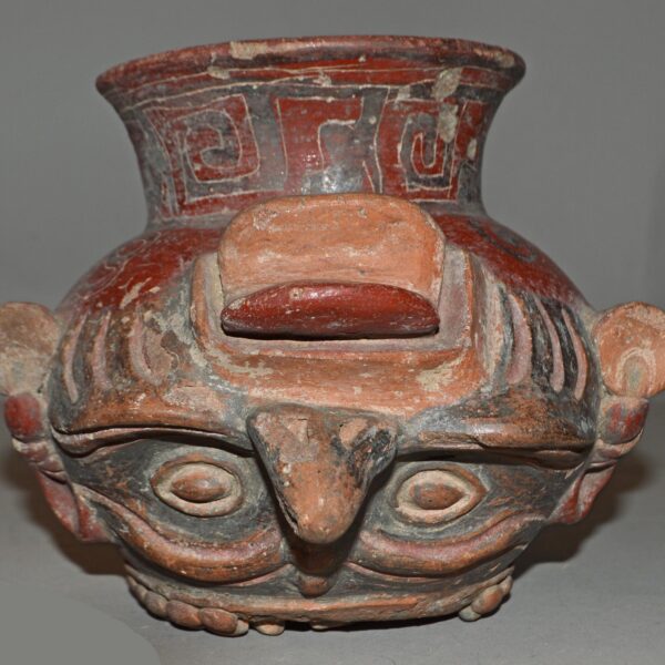 Pottery vessel in the shape of an inverted human-like head, Palenque, Mexico. Am1986,Q.78